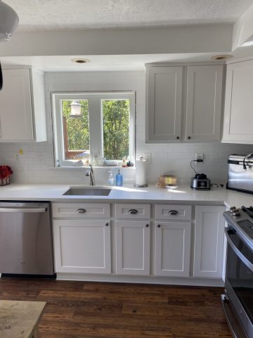 old kitchen cabinets refaced to be white with brushed metal handles old kitchen cabinets refaced to be white with brushed metal handles