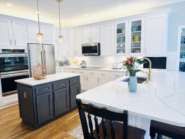 Vibrant white kitchen with new white kitchen cabinets after refacing Vibrant white kitchen with new white kitchen cabinets after refacing